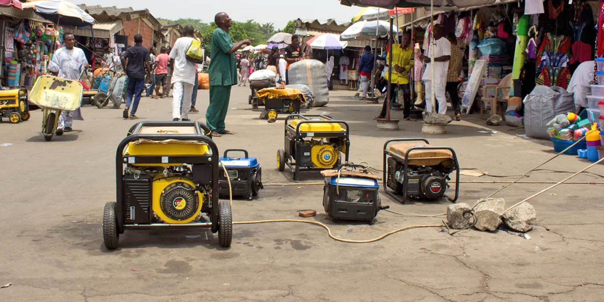 zero emission generators on display in an informal market place.